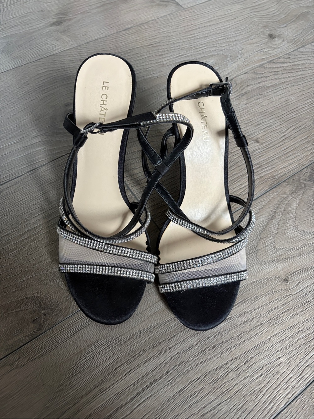 le chateau Black Strappy Heeled Sandals with Rhinestone Accent